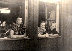 Theresienstadt, Czechoslovakia, 1944, Women in the window of a hut, from a propaganda film- 16052091664449384124.jpg