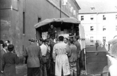 Theresienstadt, Czechoslovakia, unloading supplies from Red Cross trucks, 30-05-1945.9901646329936868887.jpg
